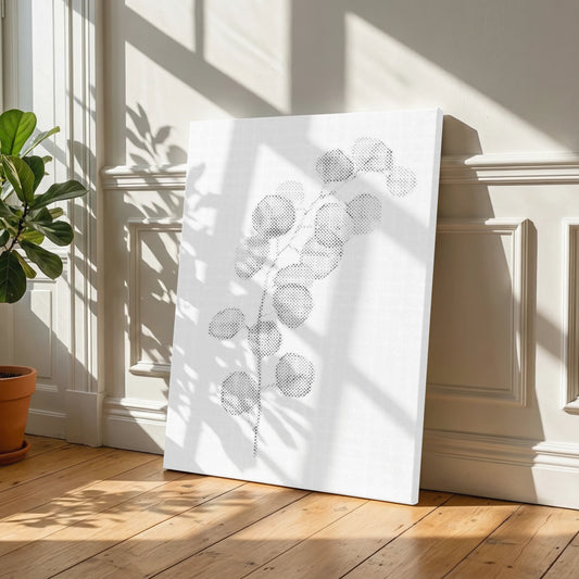 White decorative panel with geometric patterns on a wooden floor in a sunlit room. Eucalyptus Branch | Dot Painting Kit
