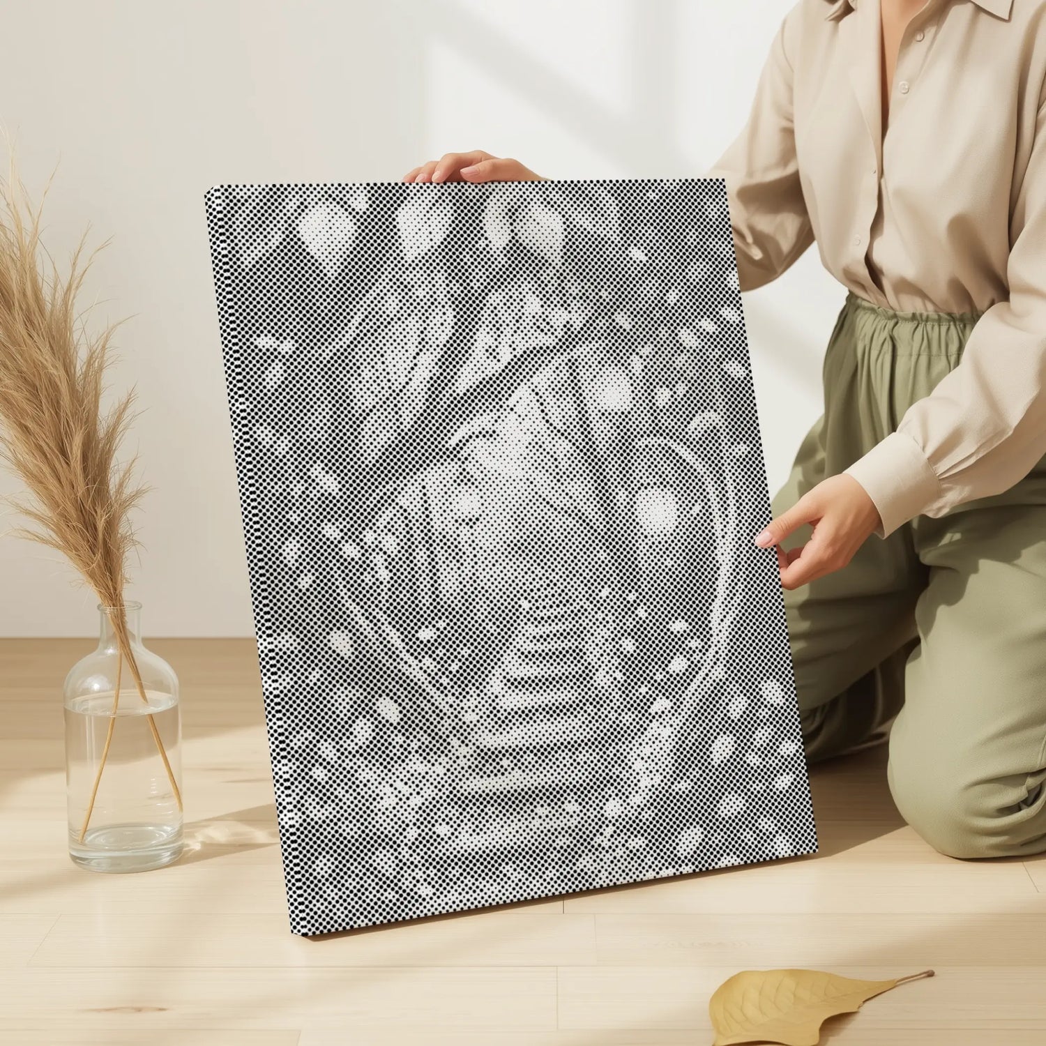 Person holding a textured black and white patterned paper on a light wooden floor. Nature & Landscape Dot Paintings