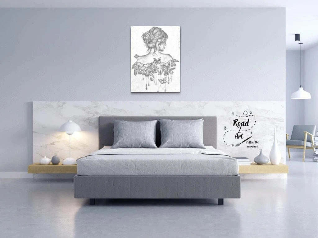 Dot art portræt af kvinde med opsat hår og sommerfugle