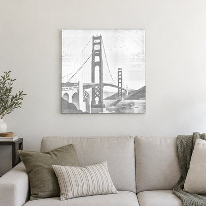 Prikmaleriet “Golden Gate Bridge”, på en lys væg i et rum med blødt dagslys.
